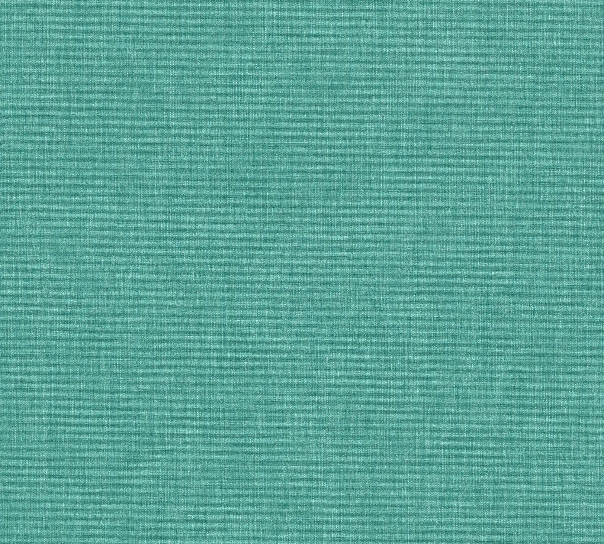 En nærbillede af tapetet Lowkey Woven - Aqua, der viser den fine vævede tekstur i en blød aqua farve.