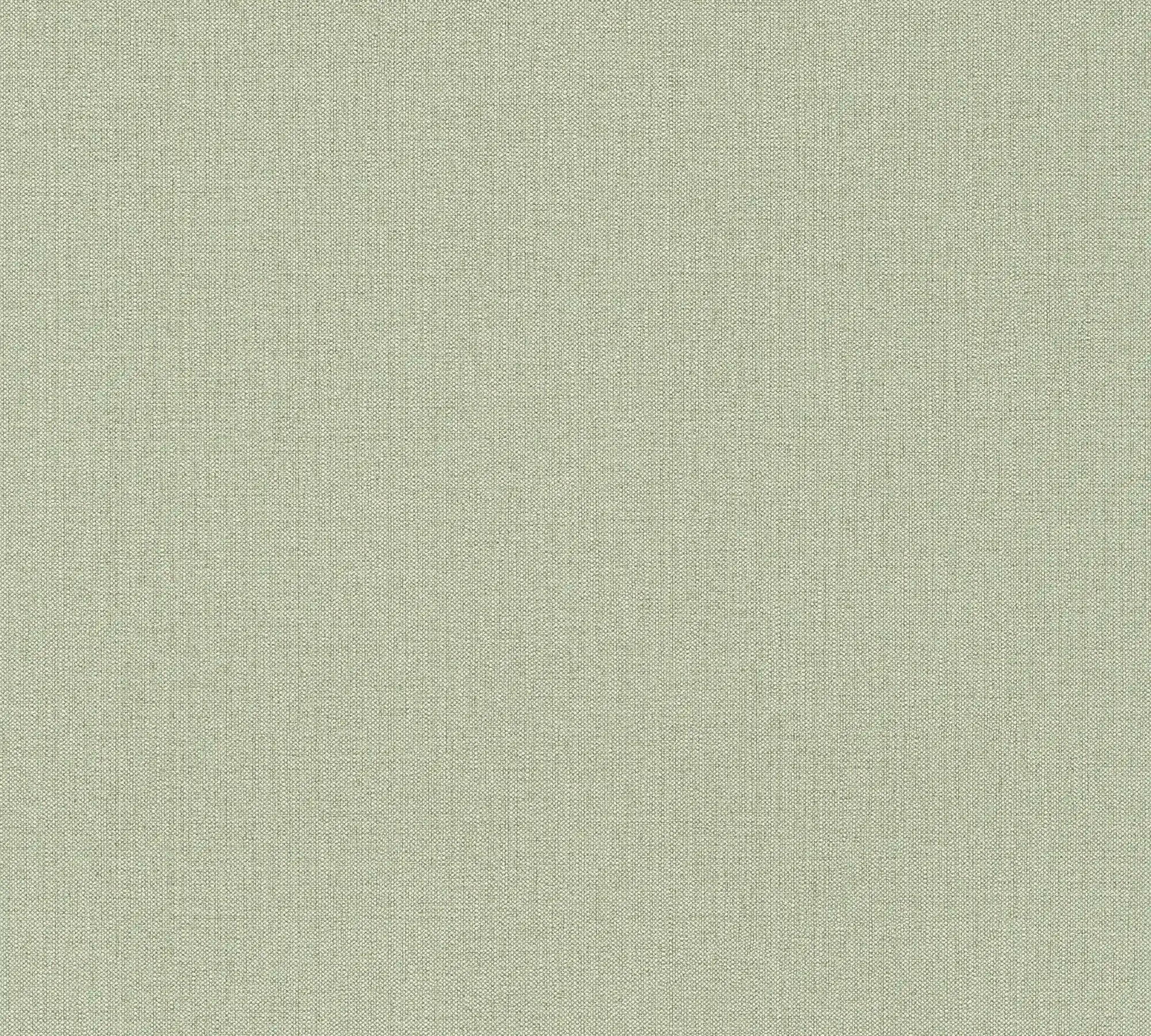 Billedet viser den fine tekstur af Minimal Weave - Willow tapet fra Nicetapet.dk, i en sart grøn farve.