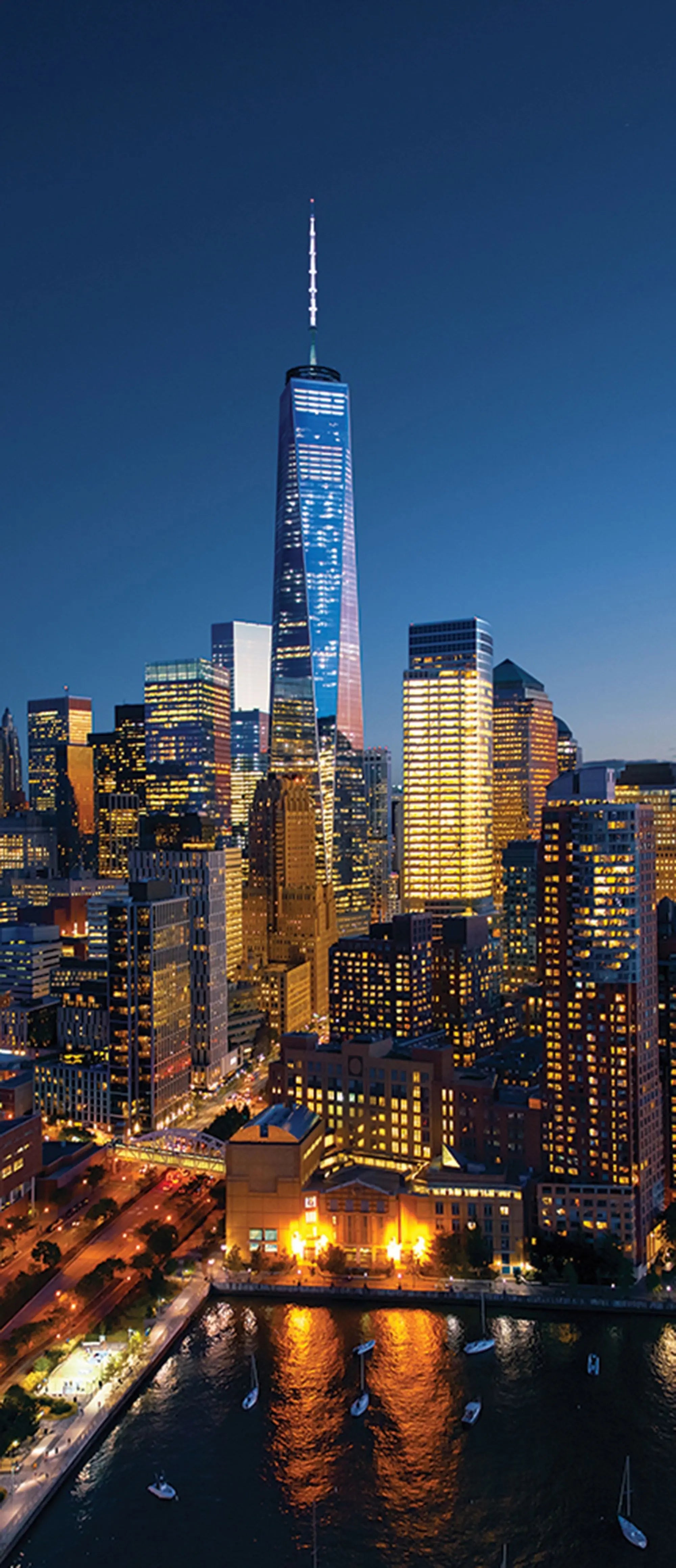 Billede 10 af Fototapet - New York City skyline ved nat med lys fra skyskrabere