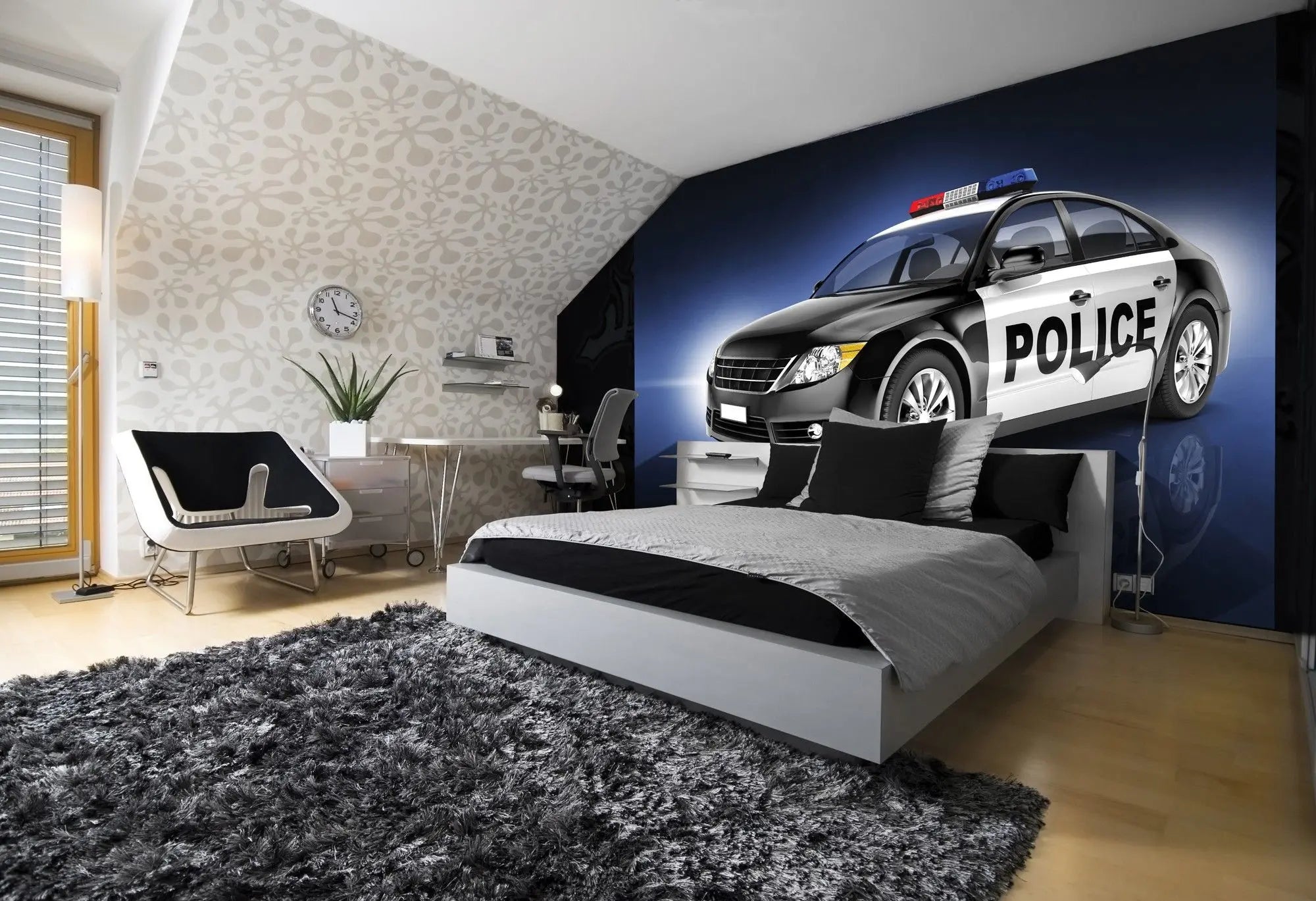 Billede 2 af Fototapet - Sort og hvid politibil med blå og rødt lys