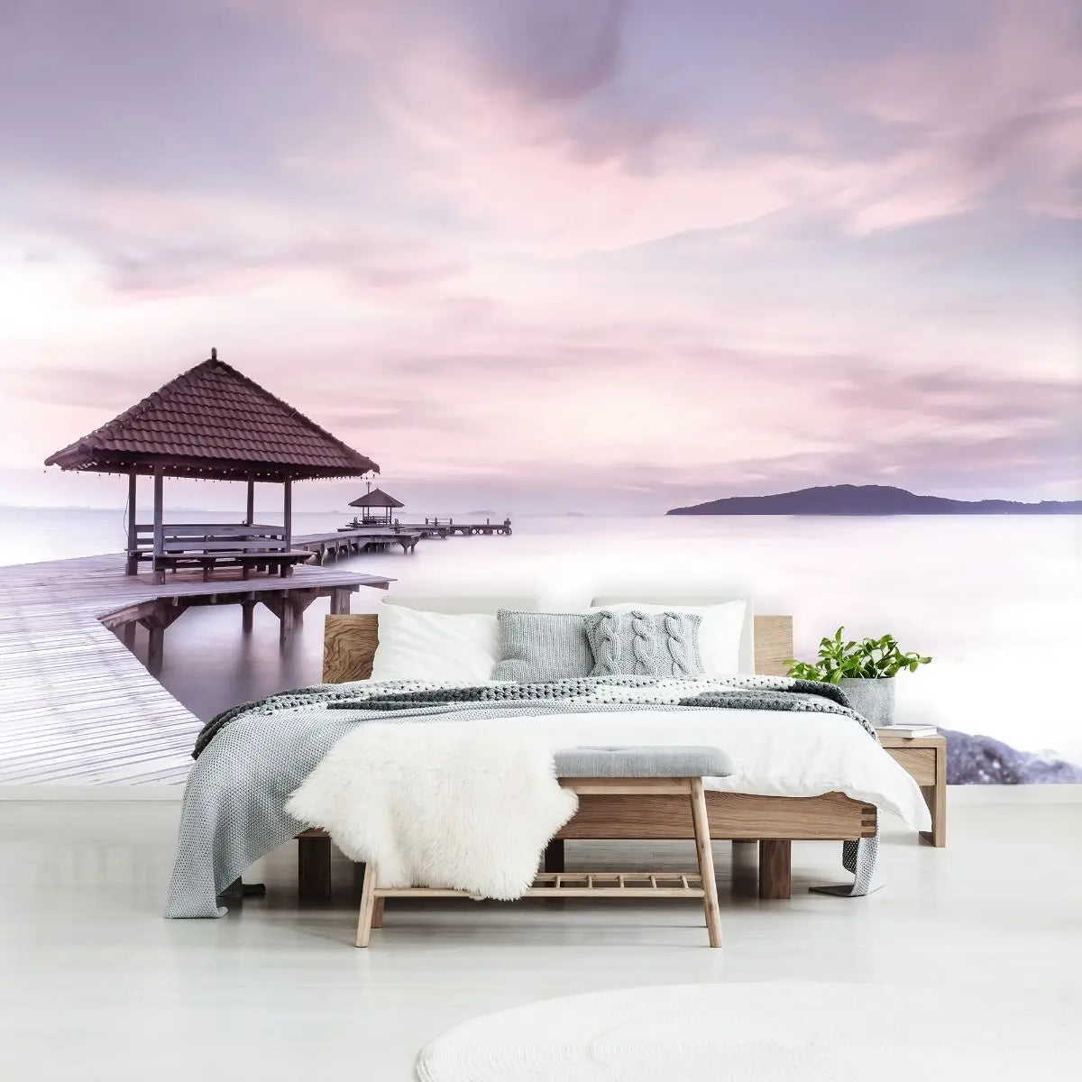 Billede 5 af Fototapet - Træmole med halmtagshytter ved havet i solnedgang