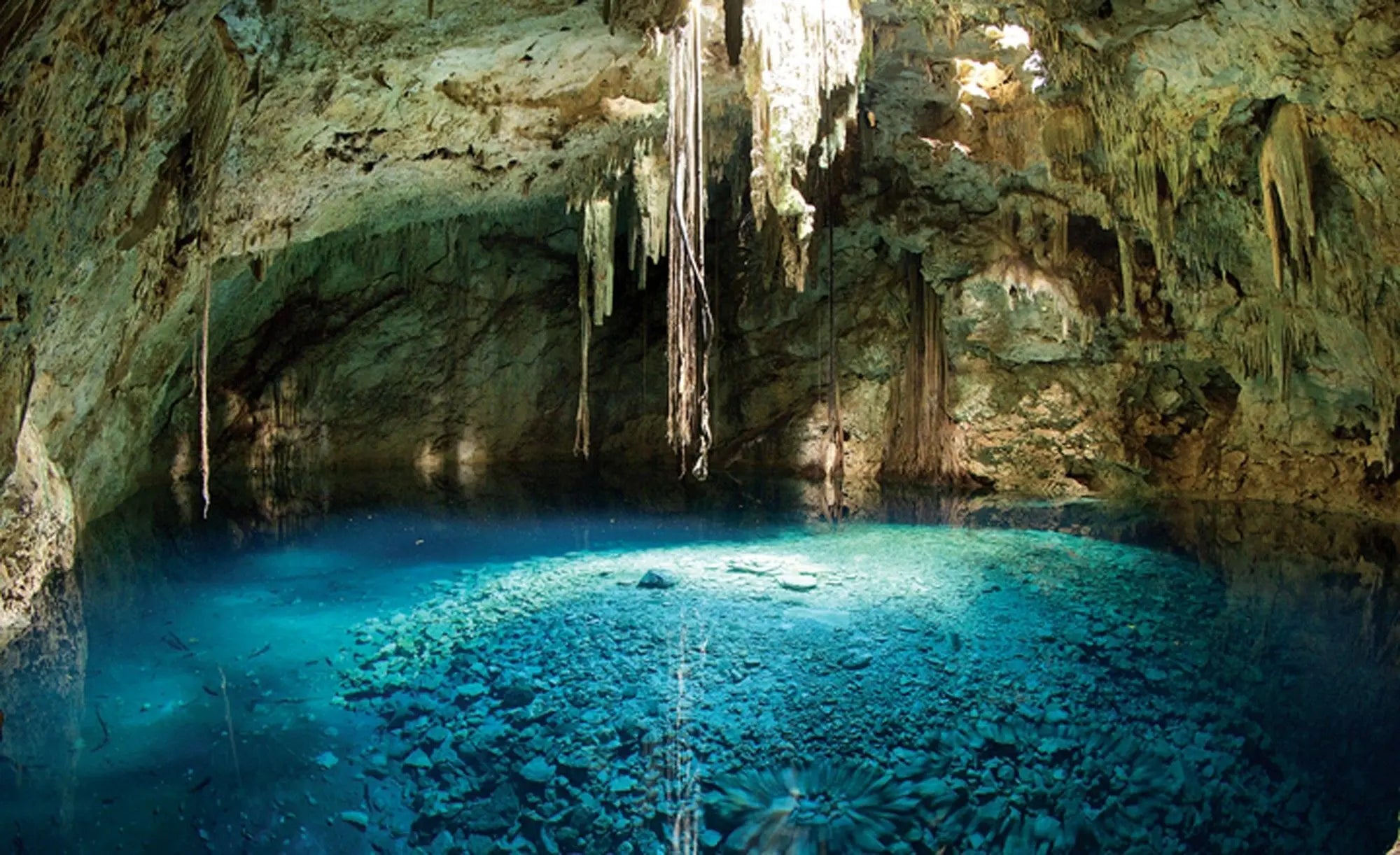 Billede 1 af Fototapet - Underjordisk grotte med azurblåt vand og stalaktitter