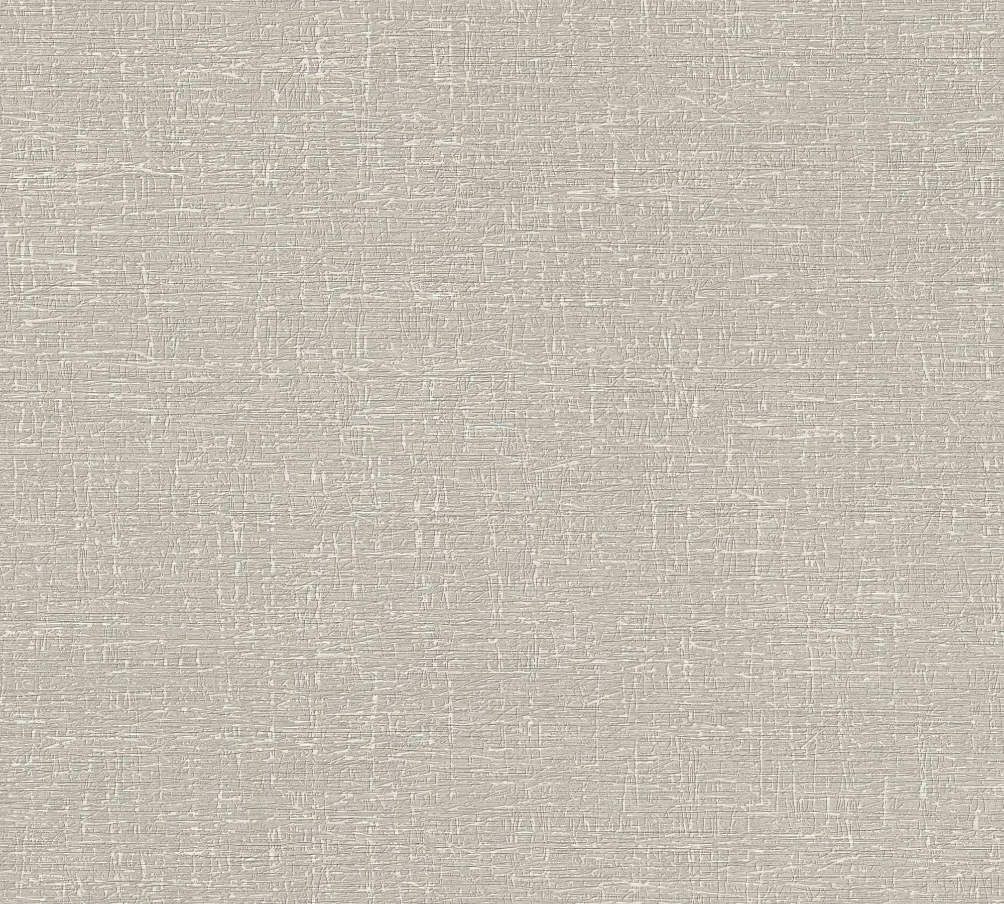 Tæt detaljebillede af Alma Textured - Sand tapet, der viser den unikke tekstur og sandfarvede nuance.