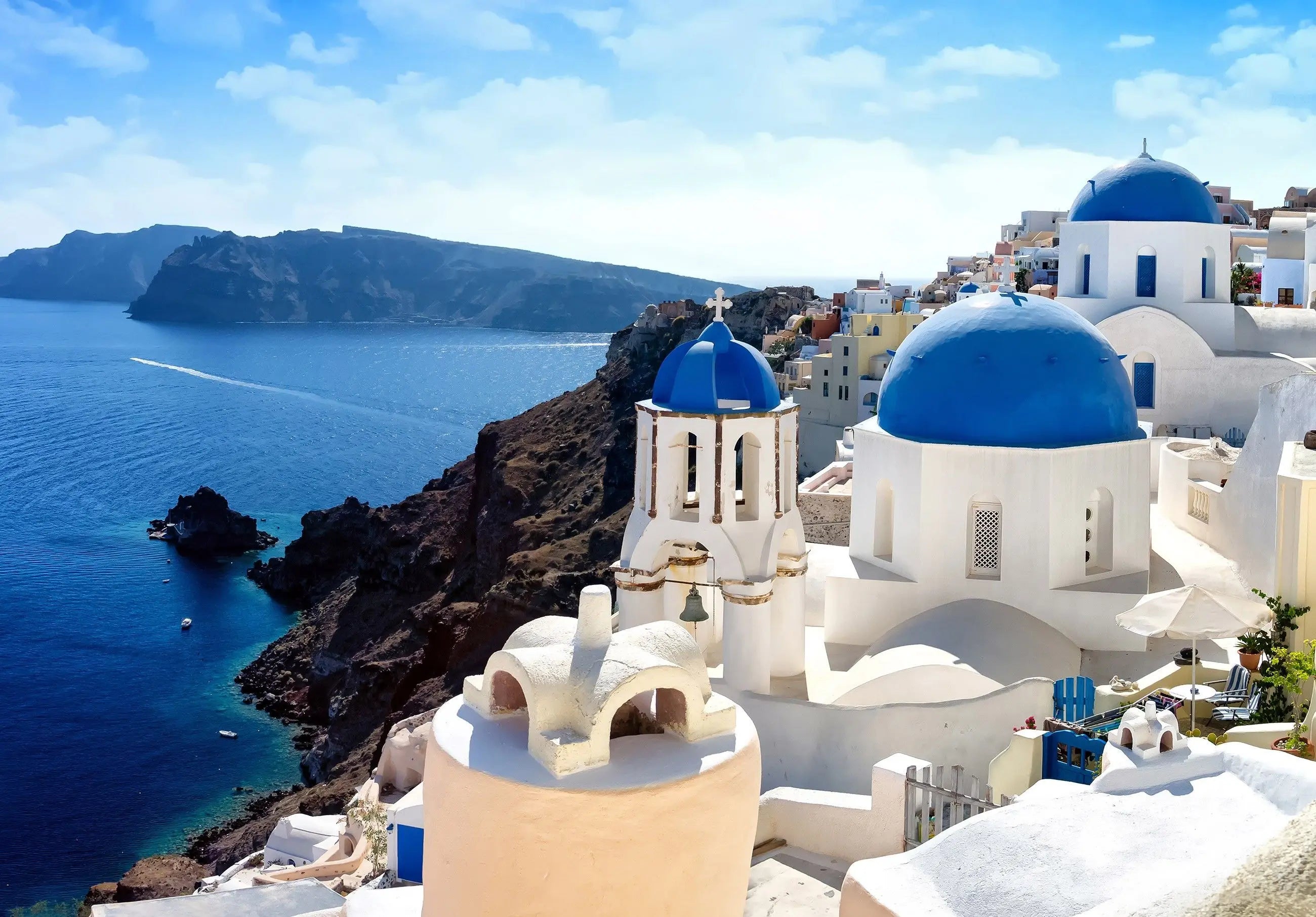 Billede 7 af Fototapet - Blå og hvide bygninger i Santorini, Grækenland ved havet
