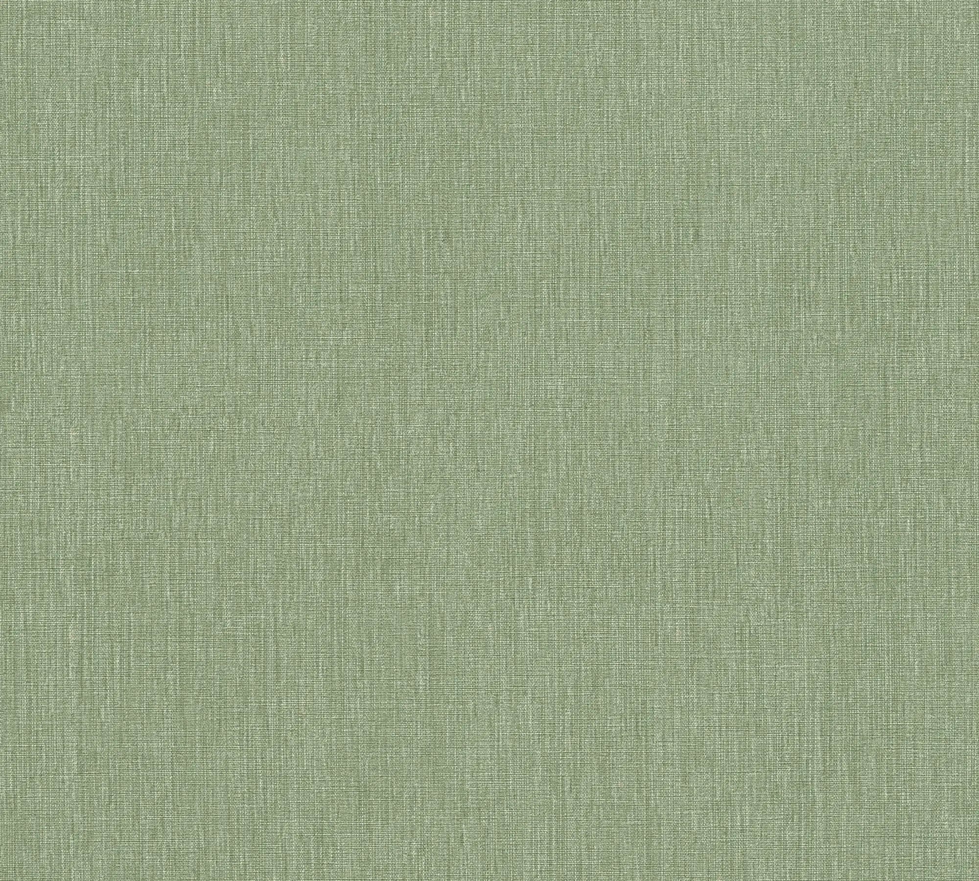 En nærbillede af Lowkey Woven - Moss tapet med en subtil, vævet struktur i en dæmpet grøn farve.